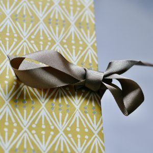 Detail of Cambridge Imprint Portfolio covered in Selvedge Mustard paper