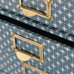 Collector's Drawers covered in Petrol Blue Little Stars patterned paper - detail