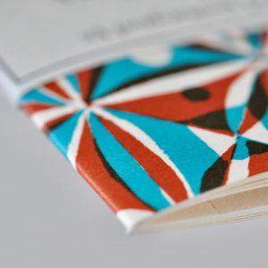 Very Slim List Book with patterned cover in Kaleidoscope Turquoise and Cocoa