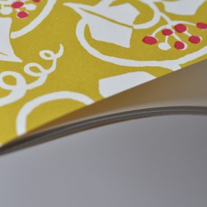 detail of Exercise Book with Piccalilli and Cranberry patterned cover