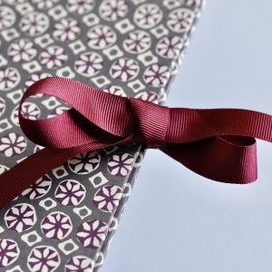 Detail of Portfolio covered in Sea Urchin patterned paper