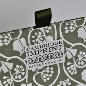 detail of Postcard Box covered in Small Ivy Stripe Sage Green PPaper by Cambridge Imprint