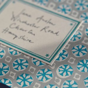 Sea Urchin Aquamarine patterned envelope with a turquoise address label